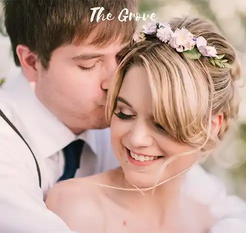 bride and groom at the grove Wedding venue