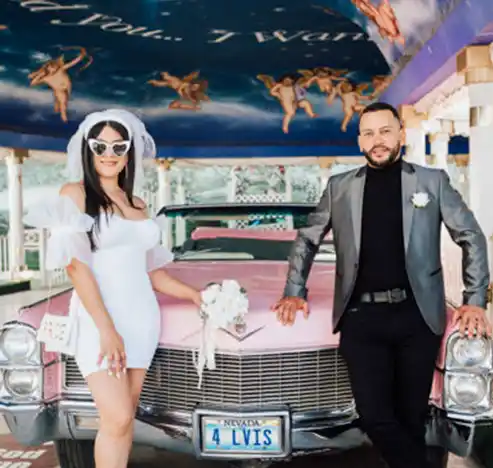 A Little White Wedding Chapel elopement in Las Vegas with pink Cadillac